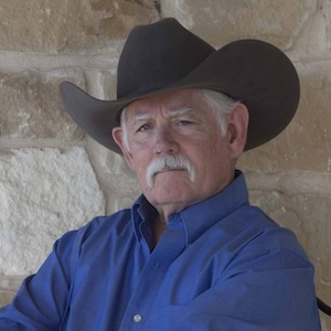 A headshot of the author, Daniel Holub.