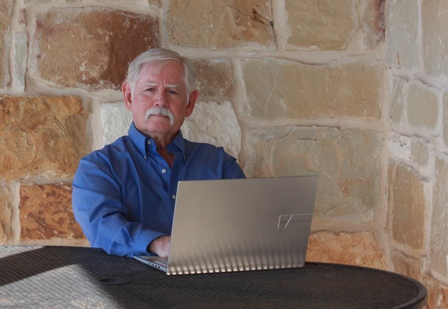 A headshot of the author, Daniel Holub.